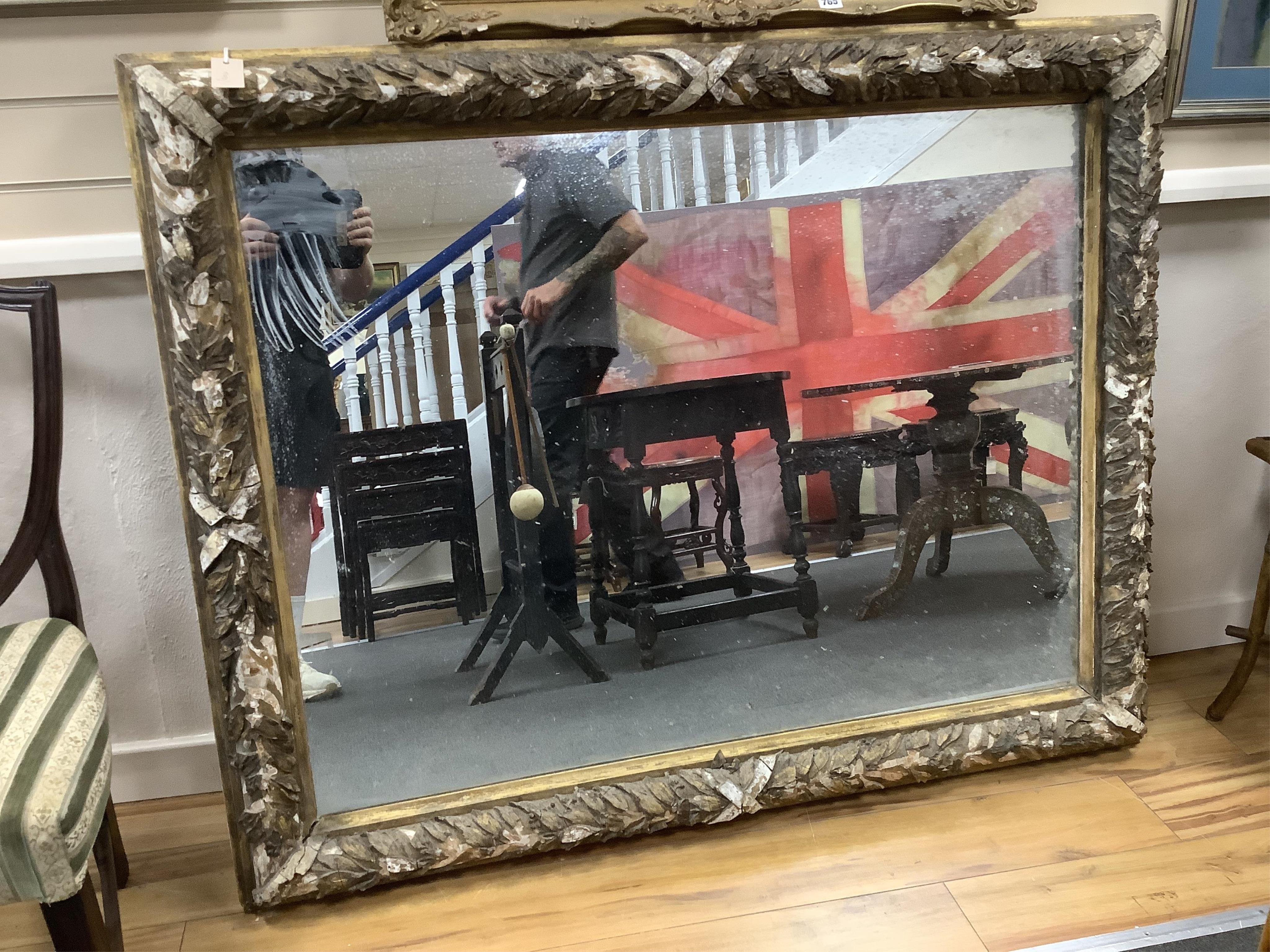 A Victorian giltwood and composition rectangular wall mirror, width 139cm, height 112cm. Condition - poor